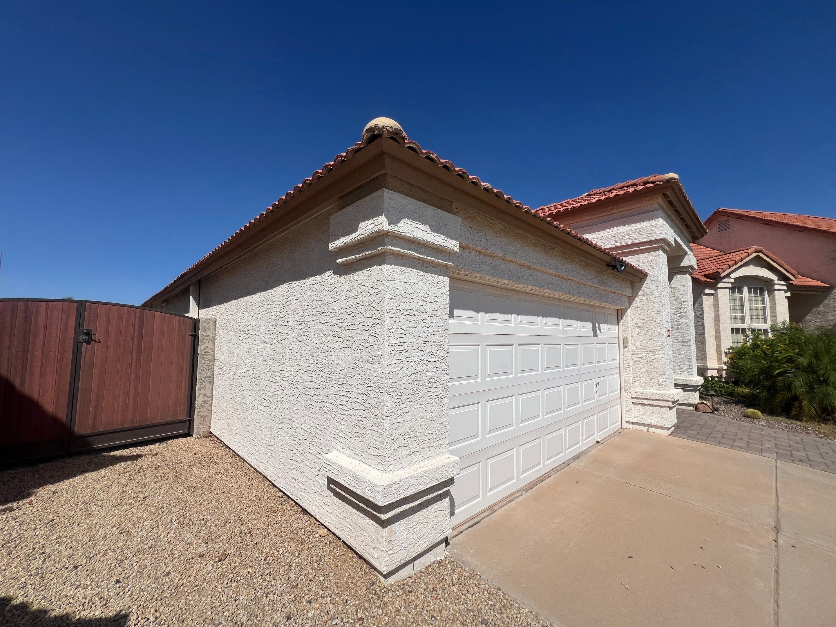 Guadalupe garage door before painting